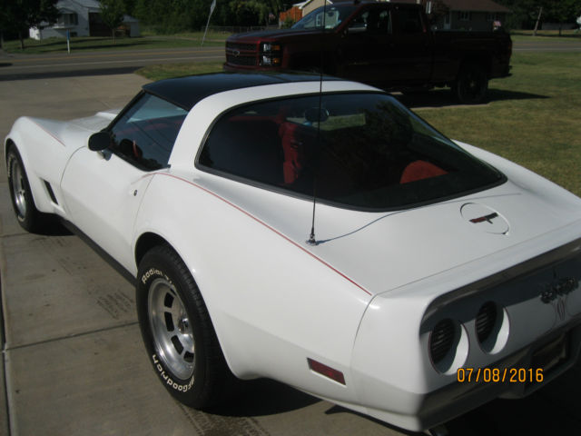 White 1981 Chevrolet Corvette Coupe with red interior