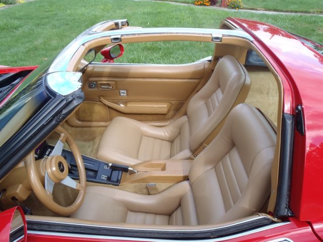 red 1981 Chevrolet Corvette with tan interior