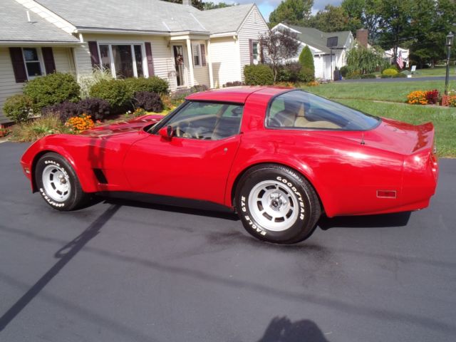 red 1981 Chevrolet Corvette with tan interior