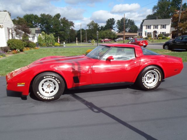 red 1981 Chevrolet Corvette with tan interior