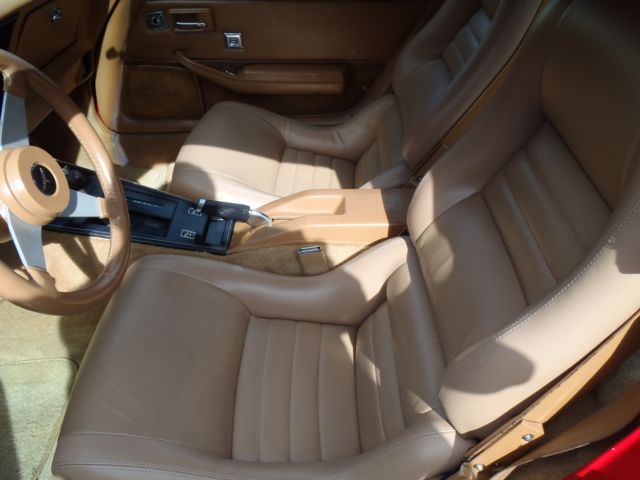 red 1981 Chevrolet Corvette with tan interior