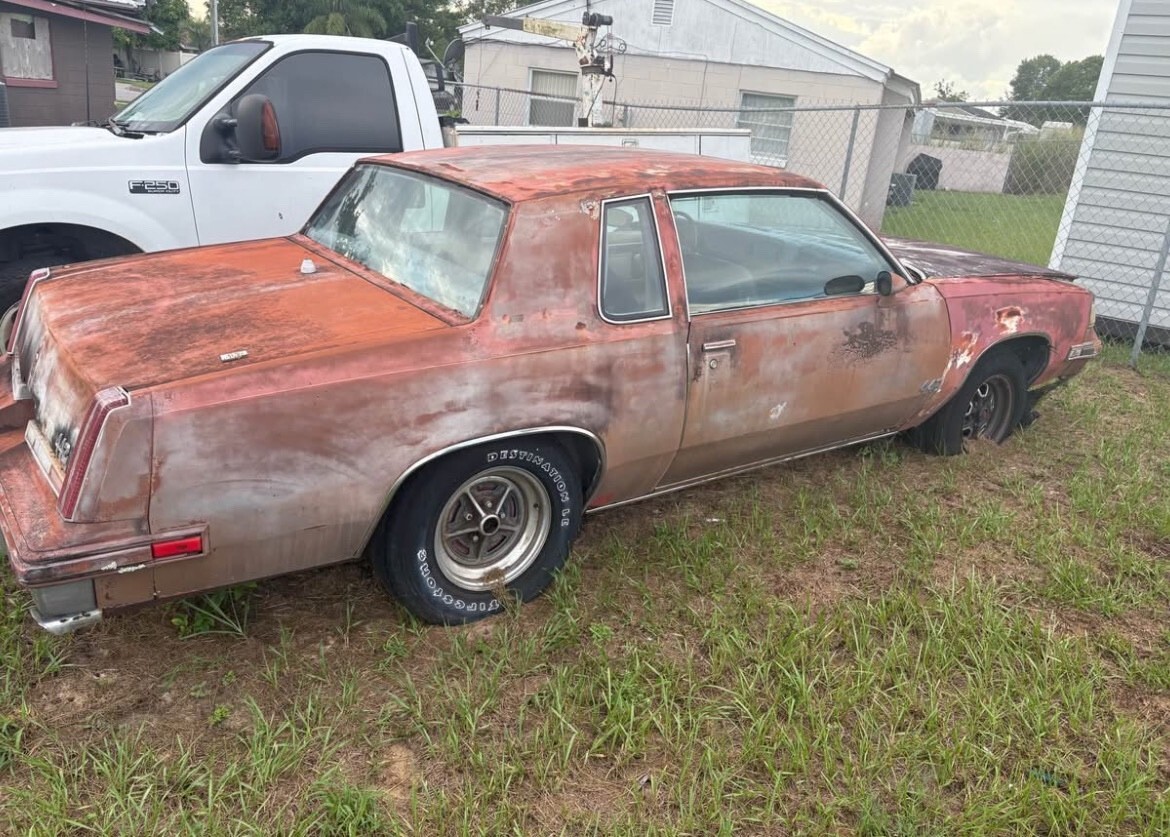 Red 1984 Oldsmobile 442