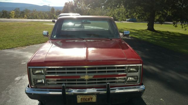 Red 1985 Chevrolet C-10 Standard Cab Pickup with Black interior