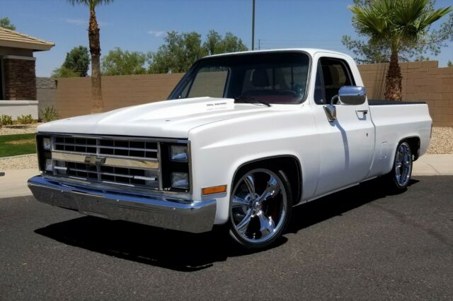 Orange 1986 Chevrolet C-10 Standard Cab Pickup with Black interior