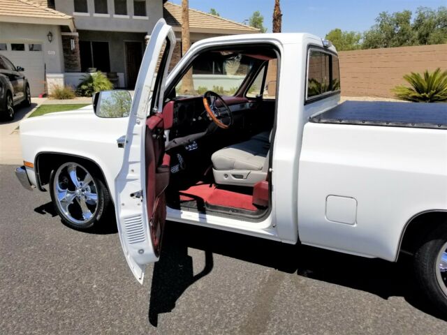 Orange 1986 Chevrolet C-10 Standard Cab Pickup with Black interior