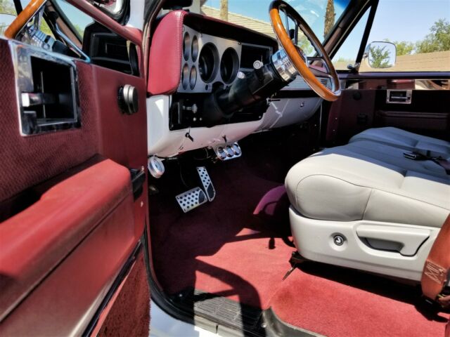 Orange 1986 Chevrolet C-10 Standard Cab Pickup with Black interior