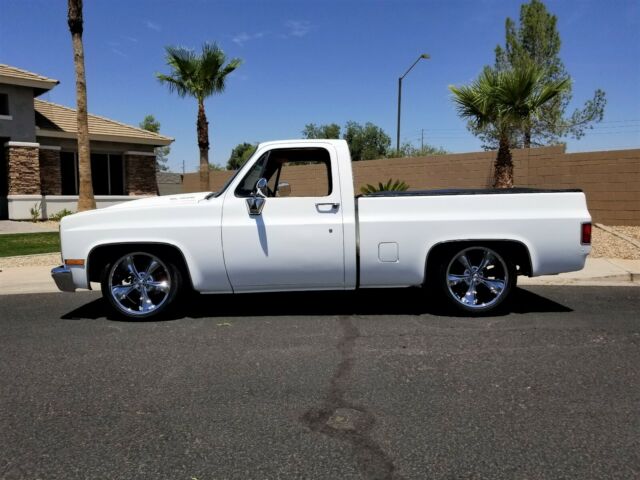 Orange 1986 Chevrolet C-10 Standard Cab Pickup with Black interior