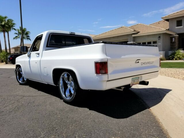 Orange 1986 Chevrolet C-10 Standard Cab Pickup with Black interior