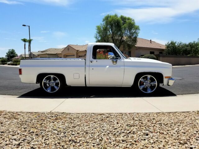 Orange 1986 Chevrolet C-10 Standard Cab Pickup with Black interior