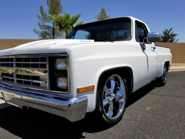 Orange 1986 Chevrolet C-10 Standard Cab Pickup with Black interior