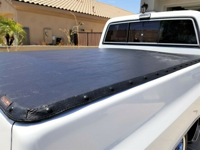 Orange 1986 Chevrolet C-10 Standard Cab Pickup with Black interior