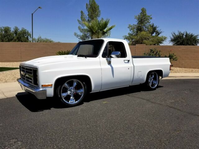 Orange 1986 Chevrolet C-10 Standard Cab Pickup with Black interior