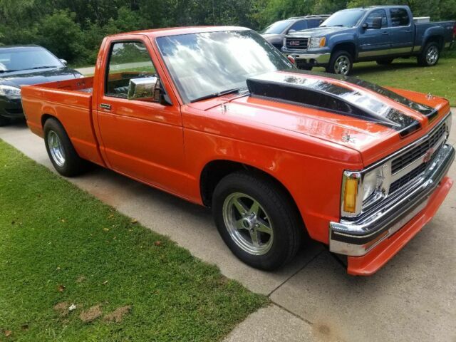 Orange 1986 Chevrolet S-10 Standard Cab Pickup with Black interior