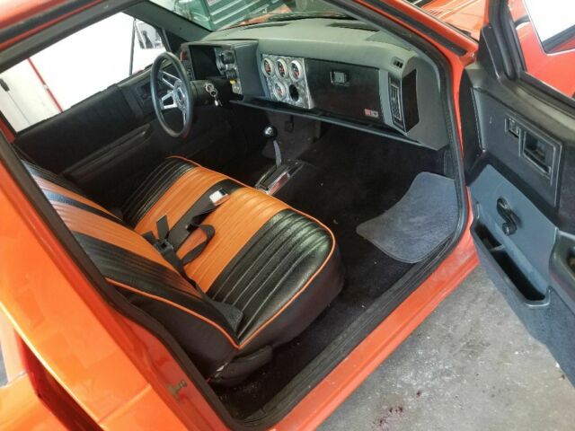 Orange 1986 Chevrolet S-10 Standard Cab Pickup with Black interior
