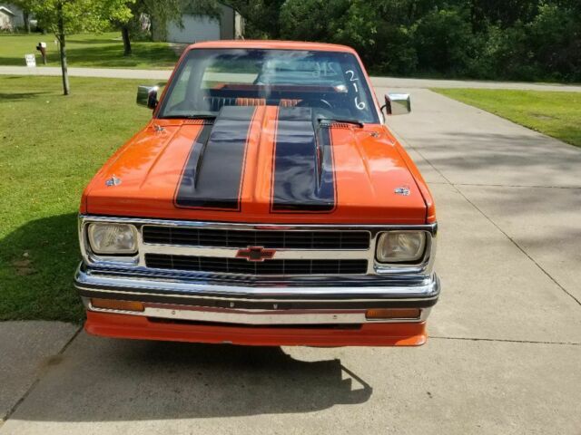 Orange 1986 Chevrolet S-10 Standard Cab Pickup with Black interior