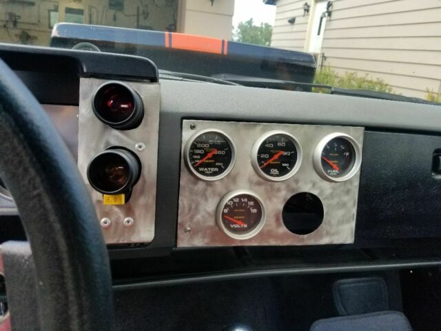 Orange 1986 Chevrolet S-10 Standard Cab Pickup with Black interior