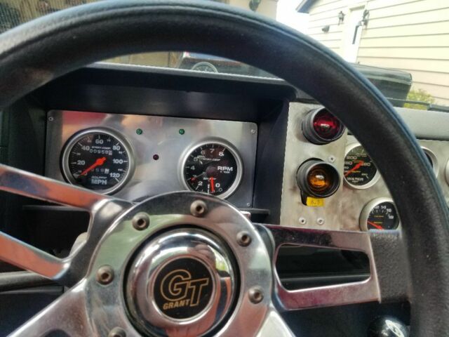 Orange 1986 Chevrolet S-10 Standard Cab Pickup with Black interior