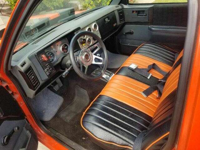 Orange 1986 Chevrolet S-10 Standard Cab Pickup with Black interior