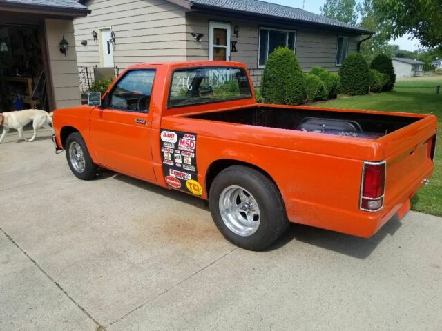 Orange 1986 Chevrolet S-10 Standard Cab Pickup with Black interior