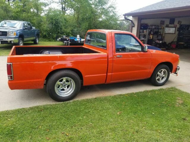 Orange 1986 Chevrolet S-10 Standard Cab Pickup with Black interior