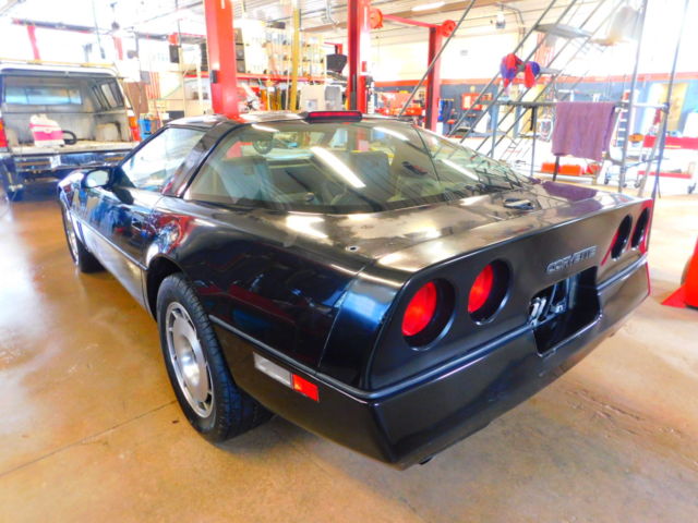 Black 1987 Chevrolet Corvette Coupe with Tan interior