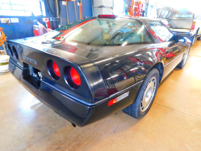 Black 1987 Chevrolet Corvette Coupe with Tan interior