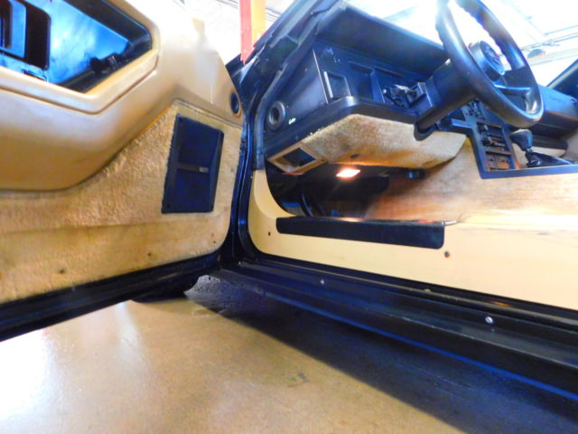 Black 1987 Chevrolet Corvette Coupe with Tan interior