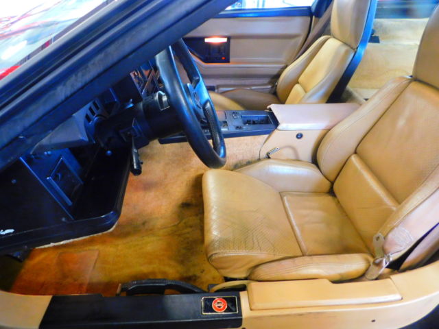 Black 1987 Chevrolet Corvette Coupe with Tan interior