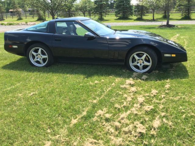 Black 1989 Chevrolet Corvette with silver interior