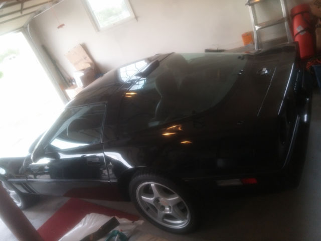 Black 1989 Chevrolet Corvette with silver interior