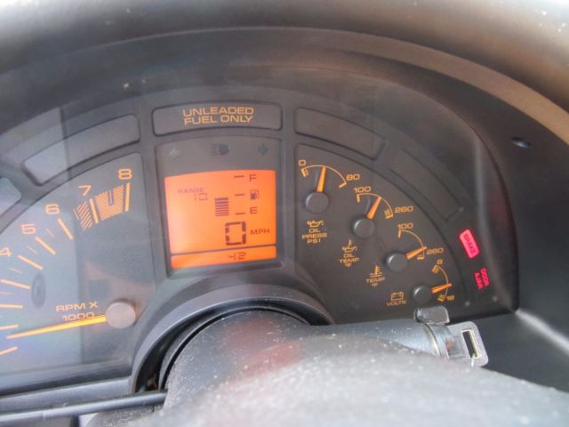 Green 1990 Chevrolet Corvette Coupe with Tan interior