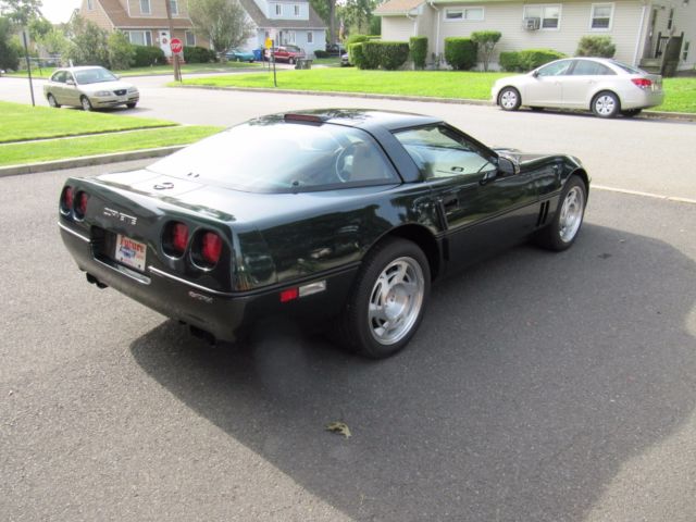 Green 1990 Chevrolet Corvette Coupe with Tan interior