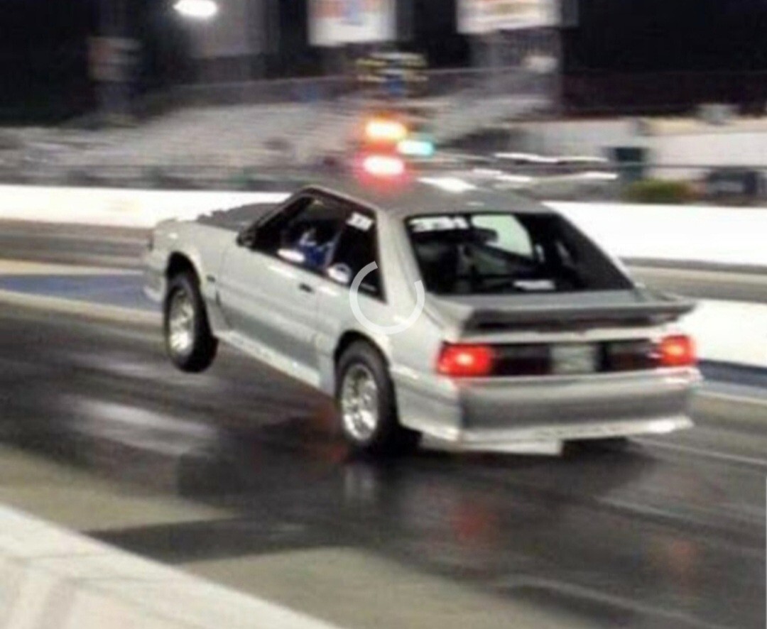 Silver 1991 Ford Mustang Hatchback with Black interior