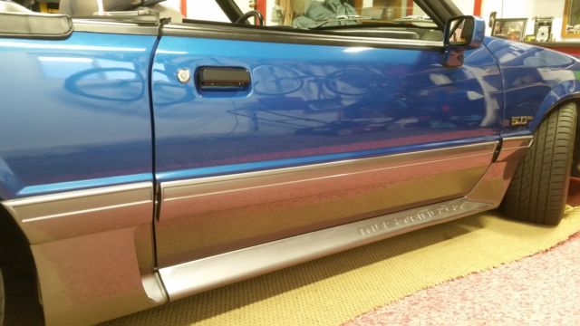 Blue 1991 Ford Mustang Convertible with Tan interior