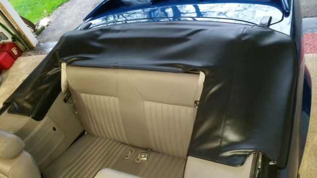 Blue 1991 Ford Mustang Convertible with Tan interior