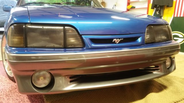 Blue 1991 Ford Mustang Convertible with Tan interior