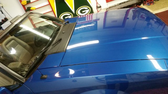 Blue 1991 Ford Mustang Convertible with Tan interior