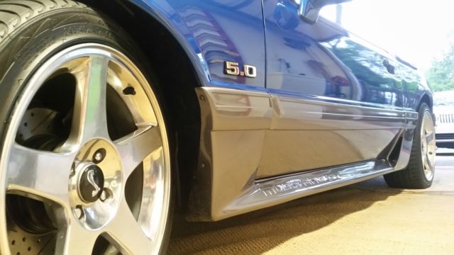 Blue 1991 Ford Mustang Convertible with Tan interior