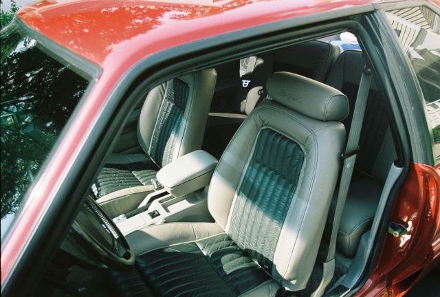 Custom Wild Strawberry with Candy Orange Flames 1991 Ford Mustang Hatchback with Gray interior