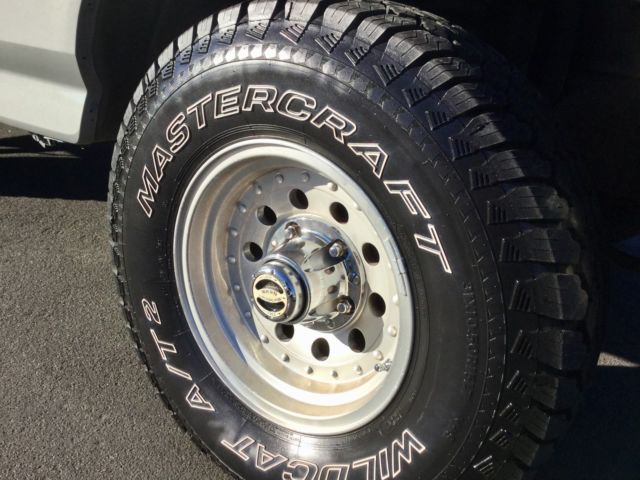 Silver 1992 Ford Bronco SUV with grey interior