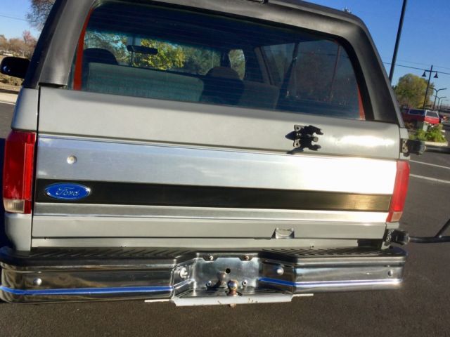 Silver 1992 Ford Bronco SUV with grey interior