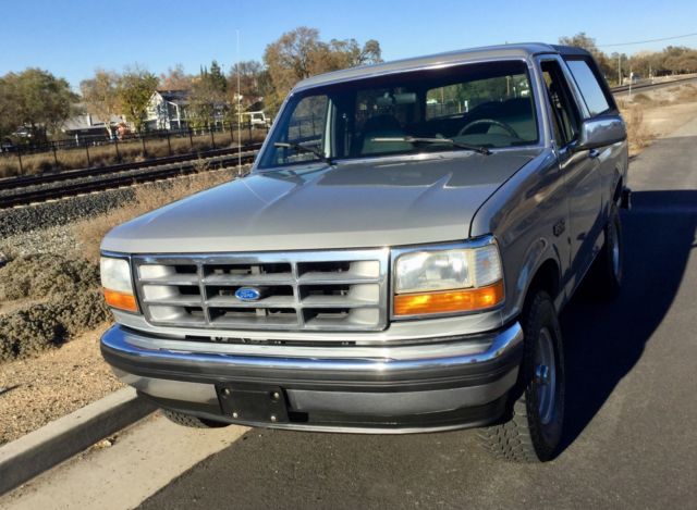 Silver 1992 Ford Bronco SUV with grey interior