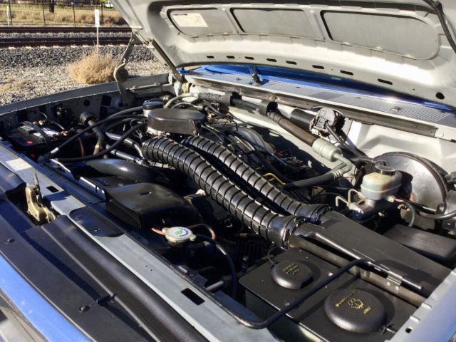 Silver 1992 Ford Bronco SUV with grey interior