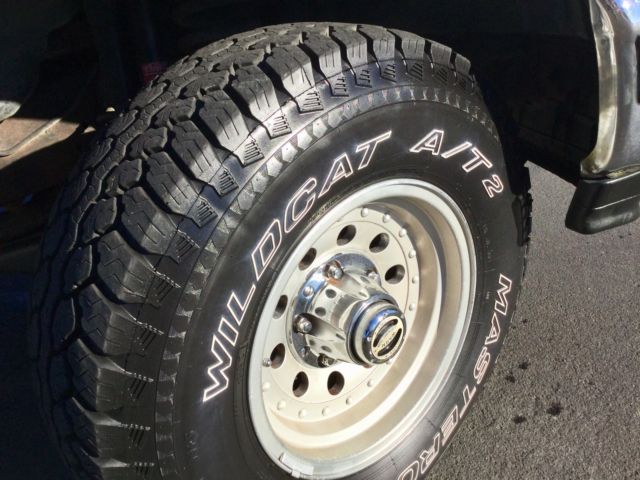 Silver 1992 Ford Bronco SUV with grey interior