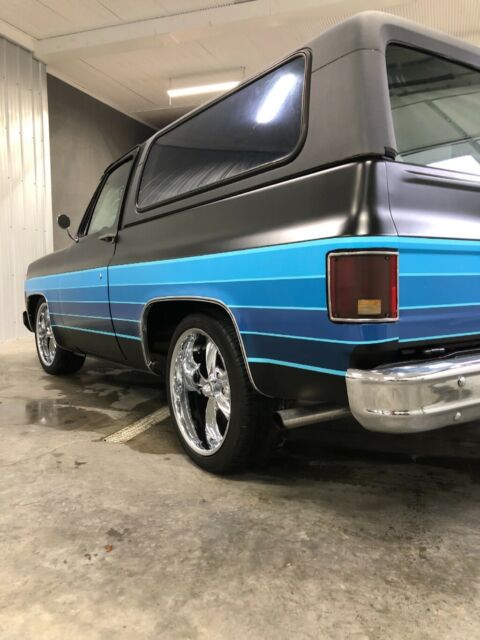 Black 1977 Chevrolet Blazer SUV with Blue interior