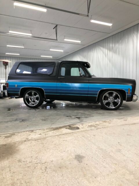 Black 1977 Chevrolet Blazer SUV with Blue interior