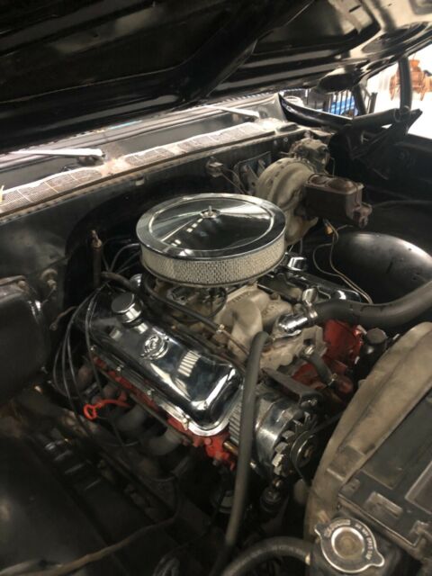 Black 1977 Chevrolet Blazer SUV with Blue interior