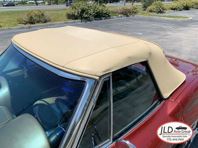 Maroon 1965 Chevrolet Corvette Convertible with Tan interior