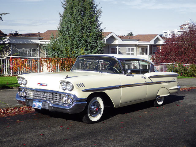 Yellow 1958 Chevrolet Bel Air/150/210 with Gold interior