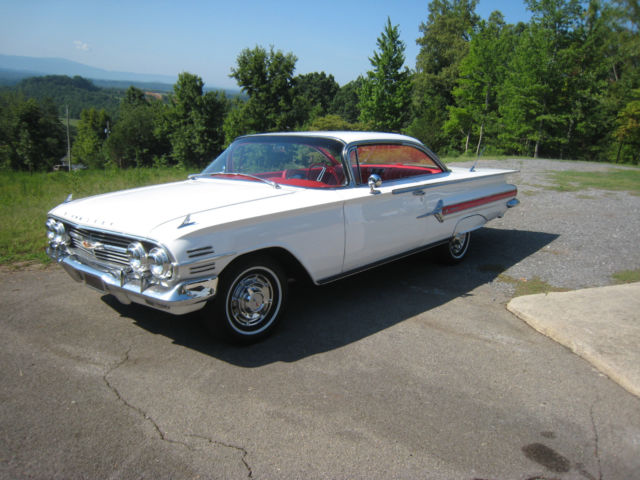White 1960 Chevrolet Impala Hardtop with red interior